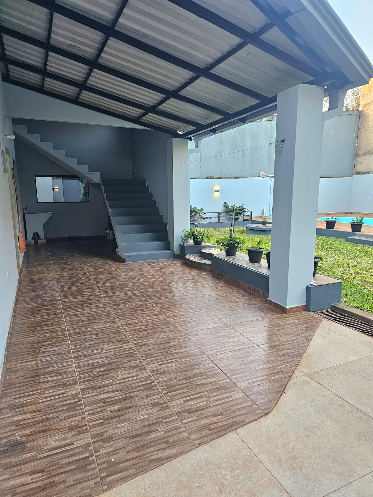 WhatsApp Image 2026-07-21 at 9.18.44 AM (2) Casa 2 pisos a metros da Av. riquelme km 7 ciudad nueva